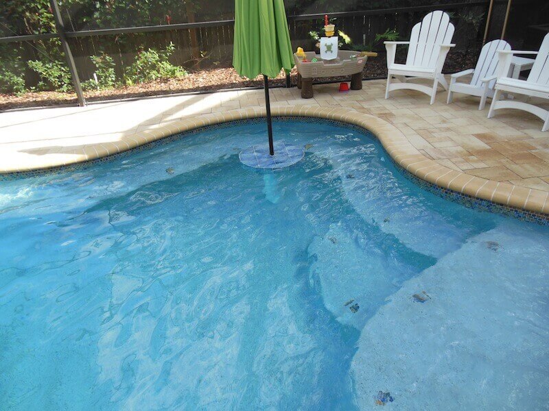 048 - Freeform Pool with Table and Benches