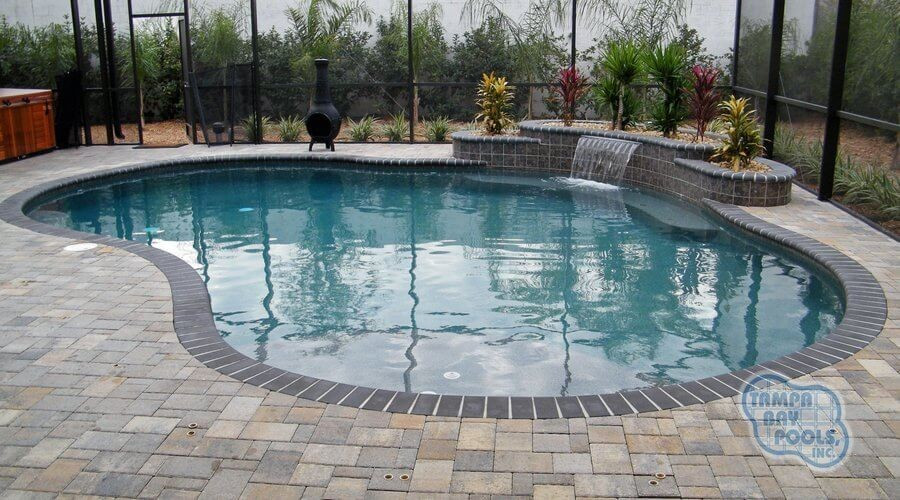 100 - Freeform Pool with Bench and Raised Sheer Descent