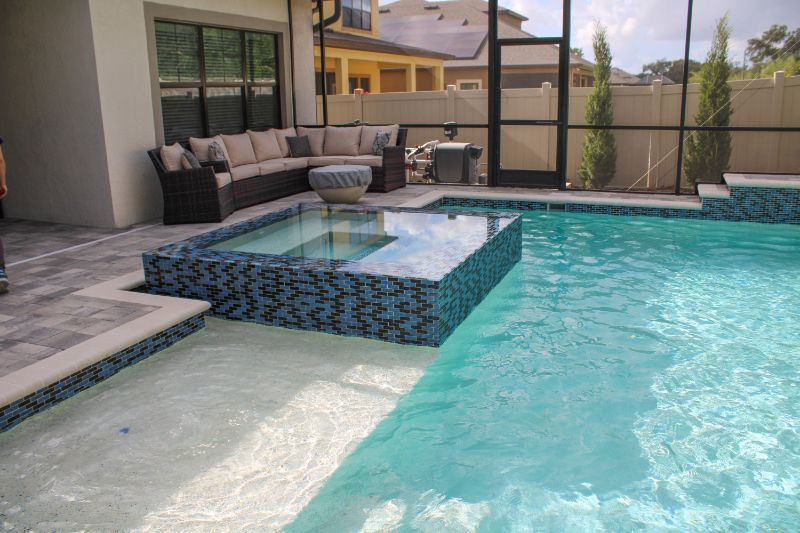 Geometric raised spa with tile