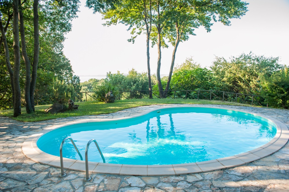 Can Pool Builders Work Around My Existing Landscaping or Structures?